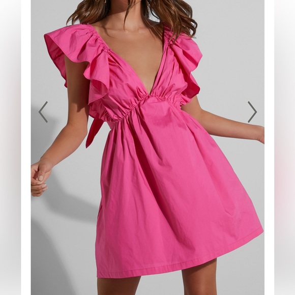 Showpo RAIZA MINI DRESS - RUFFLE SLEEVE TIE BACK PLUNGE DRESS IN FUCHSIA - Picture 2 of 3